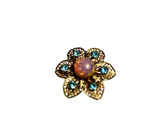 Broche vintage de flor de filigrana con aliento de dragón y diamantes de imitación azules