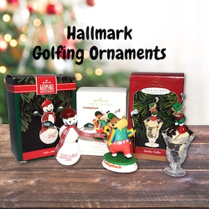May include: Hallmark Golfing Ornaments. The image features several Hallmark Keepsake ornaments with a golf theme. One ornament depicts a snowman golfer, another a bear golfer, and a third shows a sundae golfer. The ornaments are in their original boxes.