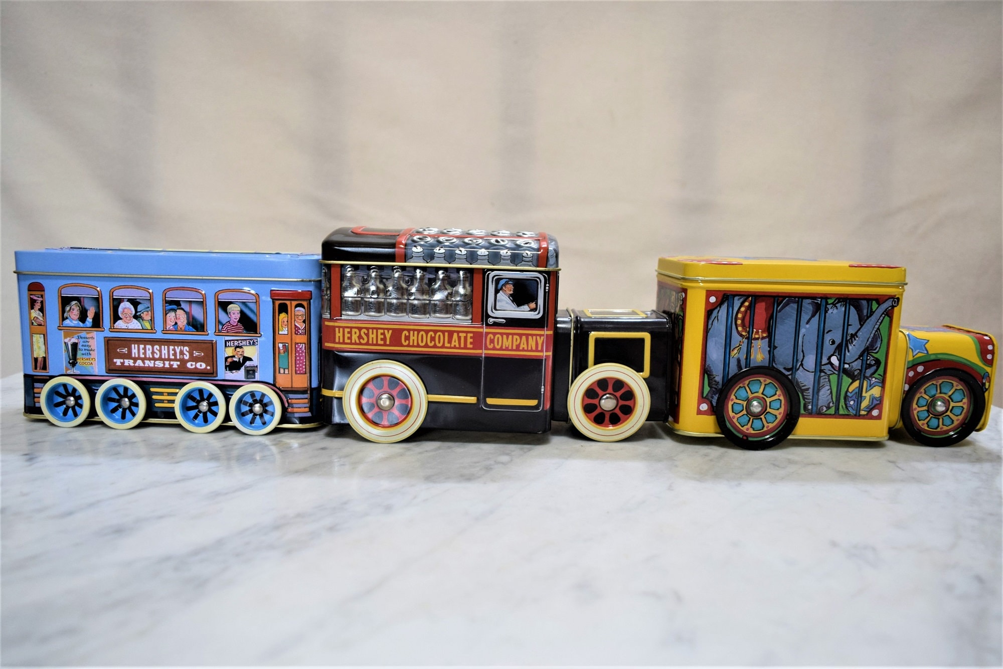 Vintage Hershey Milk and Trolley Car Tins or Tin Circus Wagon Bank