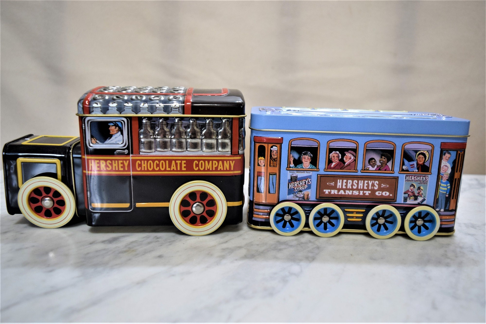 Vintage Hershey Milk and Trolley Car Tins or Tin Circus Wagon Bank