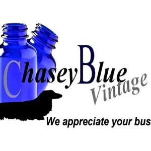 May include: Two blue glass bottles with a black silhouette of a dachshund dog and the text "Chase Blue Vintage" in black and gray lettering. The text "We appreciate your business" is also included in the image.