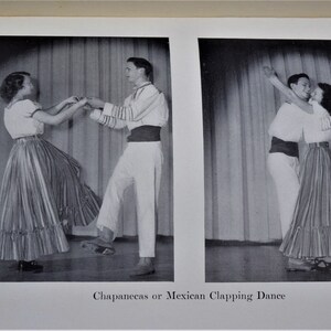 May include: Two people in traditional Mexican clothing are performing a dance called "Chapanecas or Mexican Clapping Dance". The woman is wearing a striped skirt with a ruffle and a white blouse. The man is wearing white pants, a white shirt with a black sash, and a black vest.