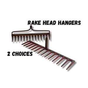 May include: Two metal rake head hangers are displayed against a white background. One is a dark brown color, and the other is red. The text "RAKE HEAD HANGERS" and "2 CHOICES" are displayed in black.