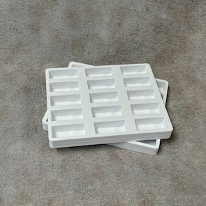 Bobbin holder for U style bobbins for Juki Cobra Cowboy Adler Artisan Seiko Pfaff Brother industrial sewing machines fits in drawer.