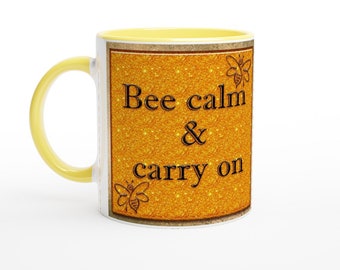 Bee Calm & Carry on White 11oz Ceramic Mug with Yellow handle and interior.