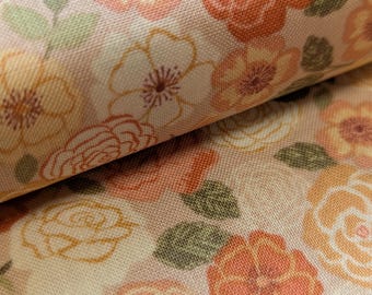 Tela de algodón floral para confección y acolchado con flores silvestres en color melocotón de Lewis e Irene Flo por 50 cm