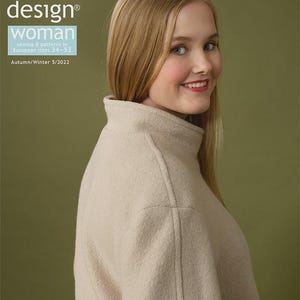 May include: The cover of "OTTOBRE design woman" magazine shows a woman in a beige coat. The magazine advertises sewing patterns in European sizes 34-52 for Autumn/Winter 5/2022. The background is a muted green.