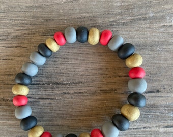 Stretch bracelets Las Vegas Golden Knights inspired colors hand rolled beads