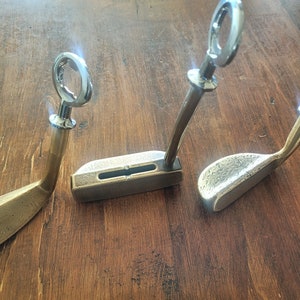 Very Old Classic Vintage Brass Putter bottle openers. Rare Brass Putters. Truly one of a kind golf gift. Great golf gifts for men.