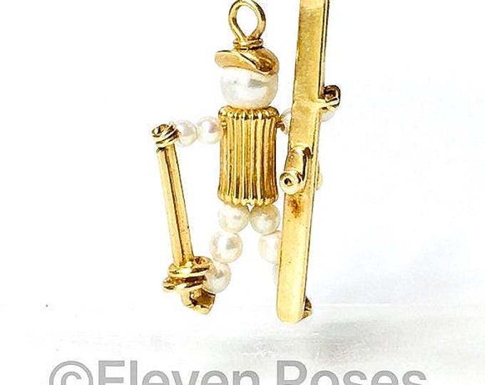 Large 14k Gold Pearl Ski Figure Pendant