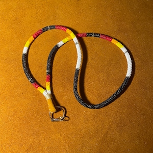 Sunburst NATIVE BEADED LANYARD black, white, grey, red, orange, yellow image 1