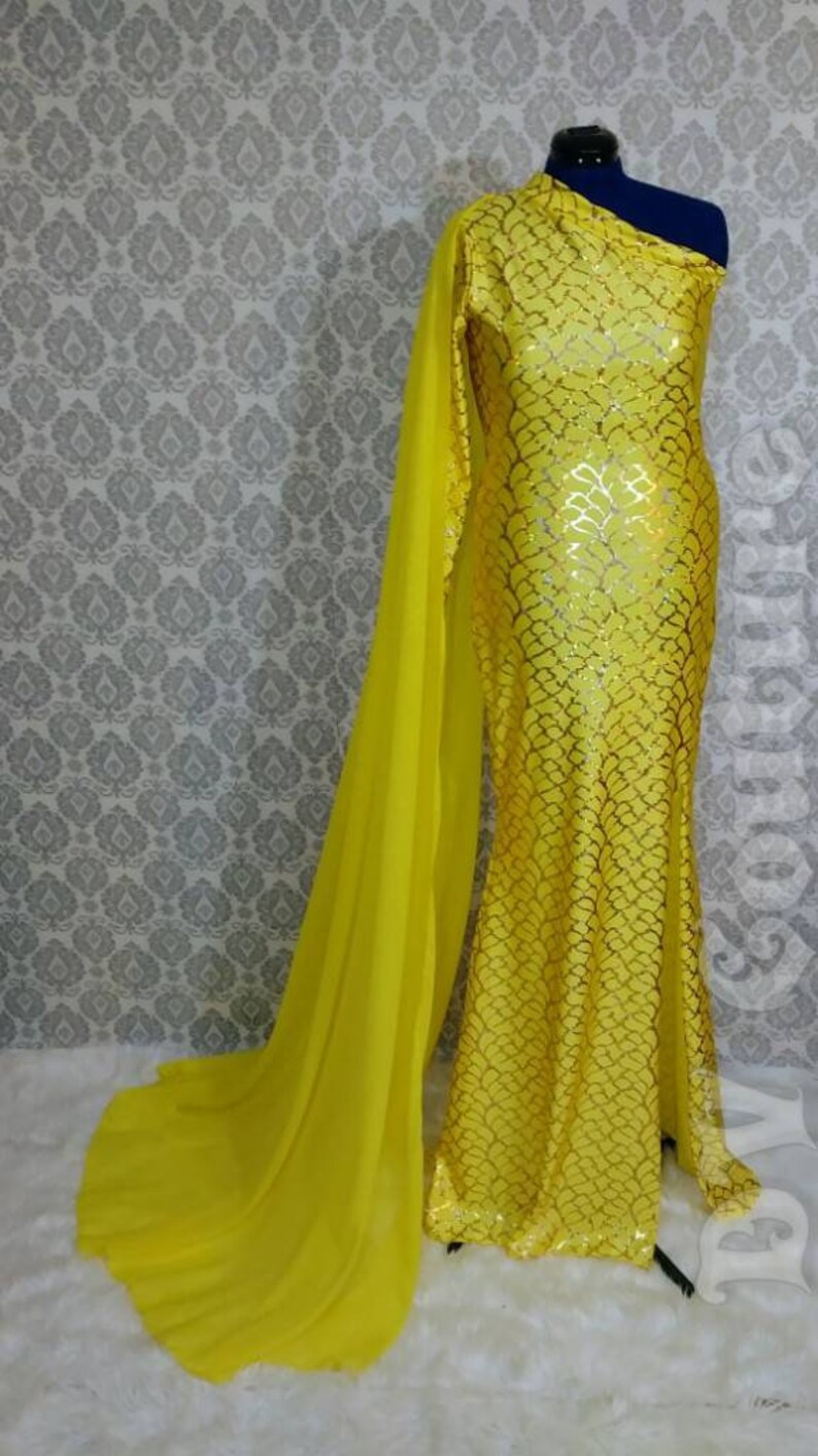 yellow dress with cape