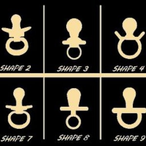 May include: Ten different pacifier designs in a light beige color are displayed against a black background. Each design is labeled with the word "SHAPE" followed by a number from 1 to 10. The designs vary in the shape of the nipple and the shield.