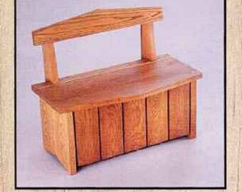 Small colonial primitive black boot bench.