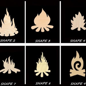 May include: Ten different wood cutout shapes of a campfire. The shapes are simple and stylized, with varying levels of detail. The wood is a light brown color.
