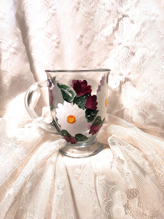 16 oz. Handpainted red rose white daisy floral design coffee mug.