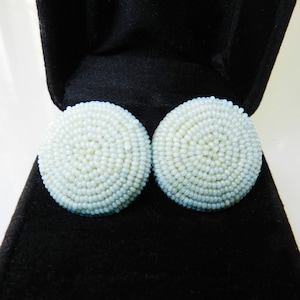 Elegant button earrings, 1950s.