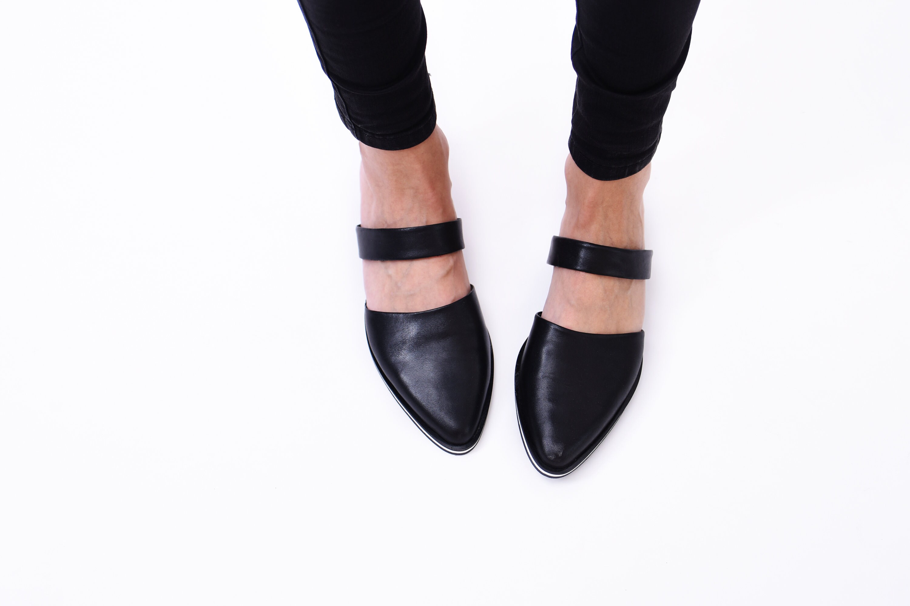 black pointed toe flat mules
