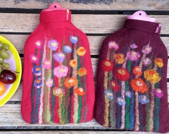 Hot water bottle with felted cover, grass and flowers, red