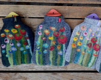 Hot water bottle with felted cover, grass and flowers, gray