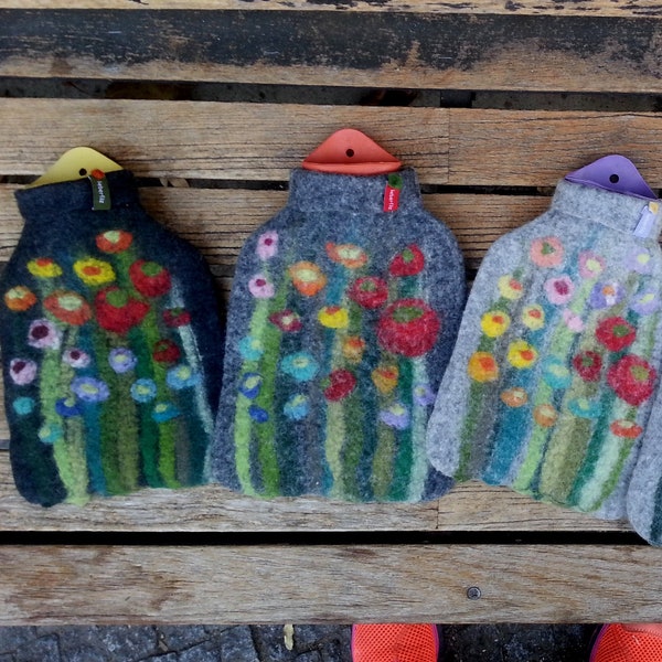 Hot water bottle with felted cover, grass and flowers, gray