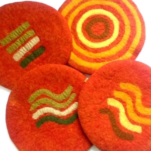 Handfelted Seat Cushion with coloured pattern mix on orange