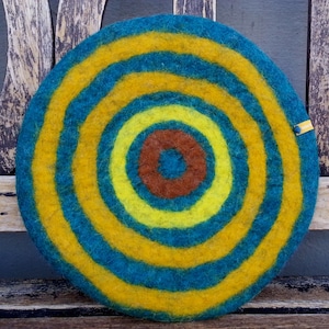 Handfelted Seat Cushion with coloured pattern mix on petrol