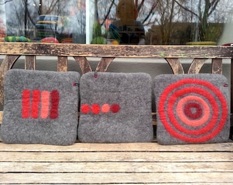 Handfelted Seat Cushion with coloured pattern mix on dark gray
