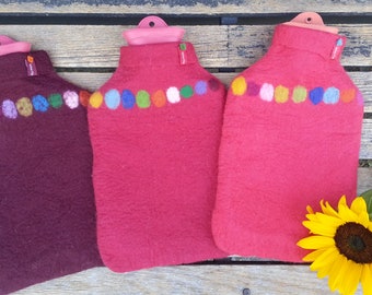 Hot water bottle with felted cover, coloured dots on red