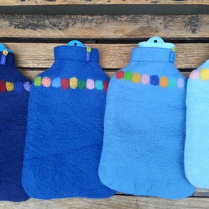 Hot water bottle with felted cover, coloured dots on blue