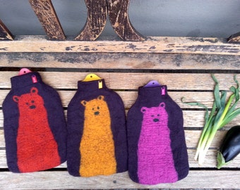 Hot water bottle with felted cover, colored bear on aubergine