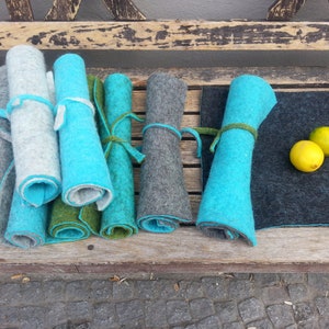 Sitting Mats to go, Variations on turquoise
