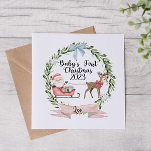 Personalisierte erste Weihnachtskarte des Babys