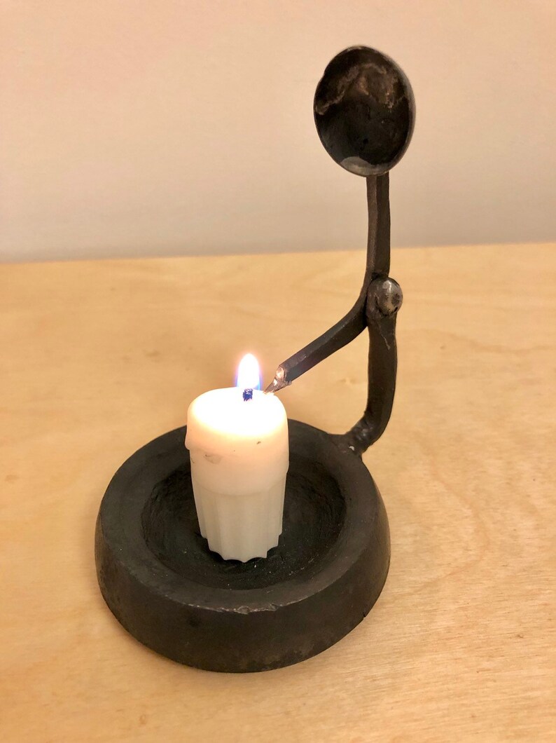 Hand self snuffing candle holder Etsy