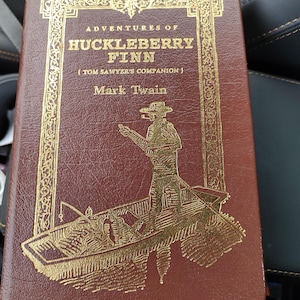 good condition leather bound mark twain adventures of huckleberry finn collector edition  easton press