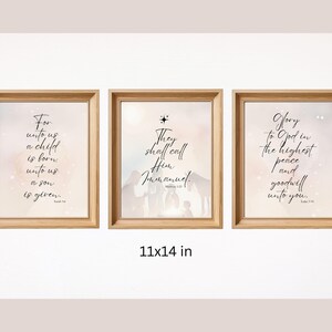May include: Three 11x14 inch framed prints with a watercolor background and black text. The first print says "For unto us a child is born, unto us a son is given." The second print says "They shall call Him Immanuel." The third print says "Glory to God in the highest peace and goodwill unto you."
