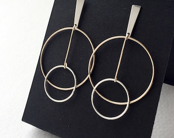 Pendulum circle earrings, Large circle hoop earrings, Mixed metal geometric statement earrings, Double circle hoop earrings