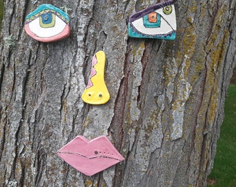 Picasso tree face. Handmade/handpainted ceramic