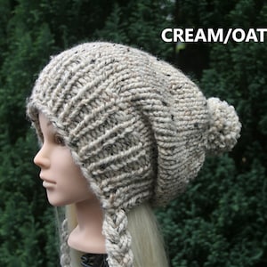 Berretto in maglia con paraorecchie e pompon - 9 colori