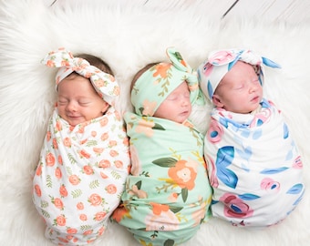 cute baby girl swaddles