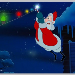 May include: Santa Claus is hanging Christmas lights on a house. He is flying in the air and holding a string of lights in his hand. The house is covered in snow and icicles. The sky is dark blue with stars.