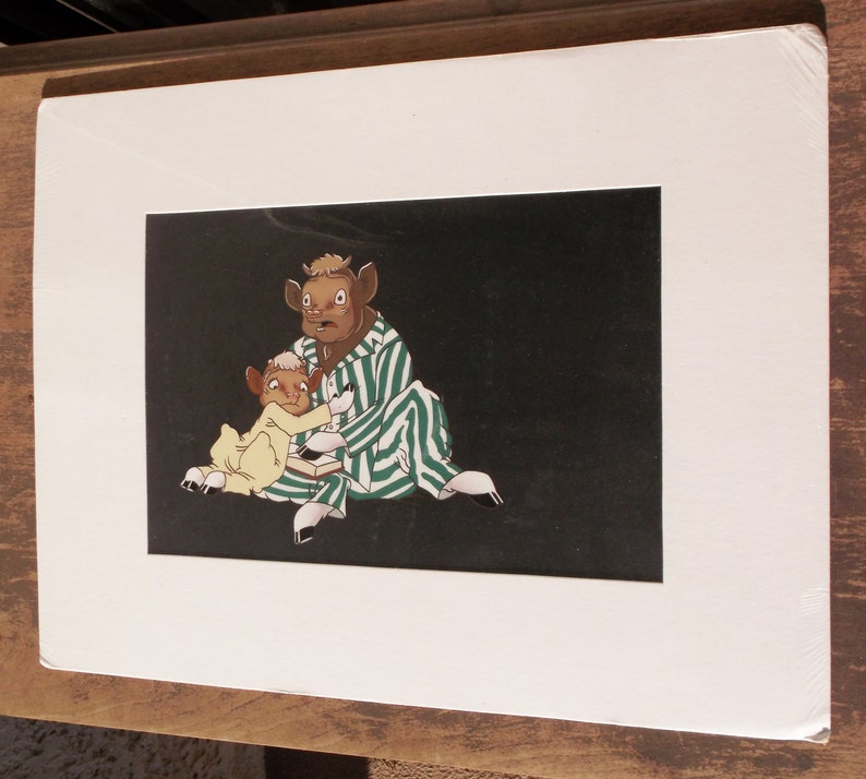 May include: A black and white illustration of two cartoon cows wearing pajamas. The cow on the left is wearing yellow pajamas and the cow on the right is wearing green and white striped pajamas.