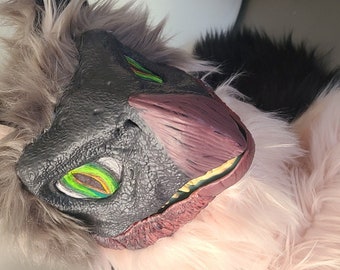Black and Pink partial Therizinosaurus. Head only