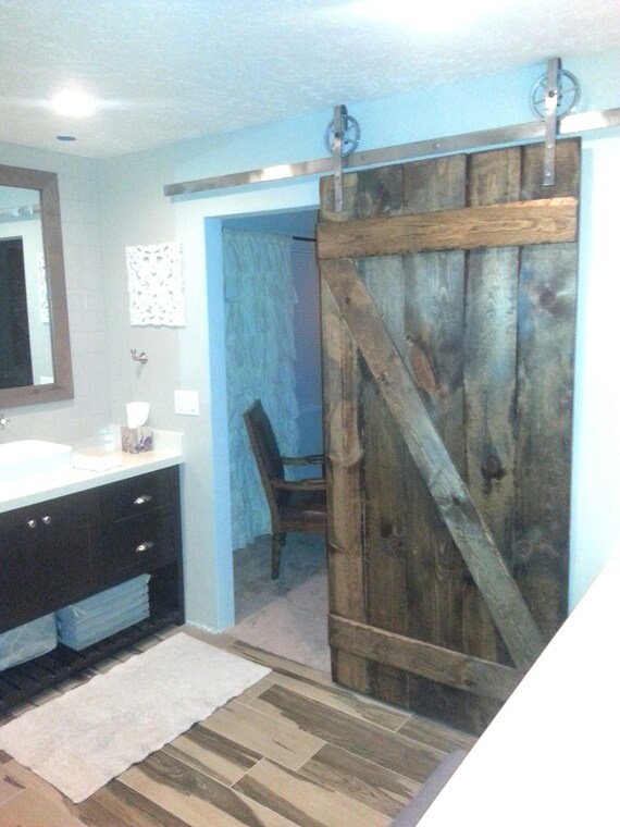 Vintage Industrial Spoked European Sliding Barn Door Closet Image 0