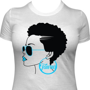 May include: White t-shirt with a black and white illustration of a woman wearing sunglasses and a large hoop earring with the word "Taurus" written inside.