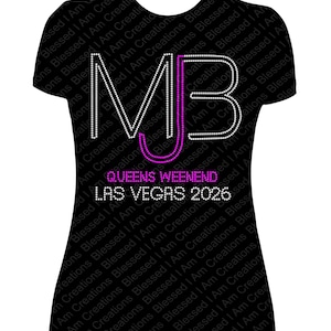 May include: Black t-shirt with the letters "MJB" in white and purple rhinestones. The text "QUEENS WEENEND LAS VEGAS 2026" is below the letters. The shirt has a scoop neck.