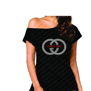 May include: A white ceramic mug with a black handle and the text "But First, Coffee" in a black, bold font. The mug is on a white surface.