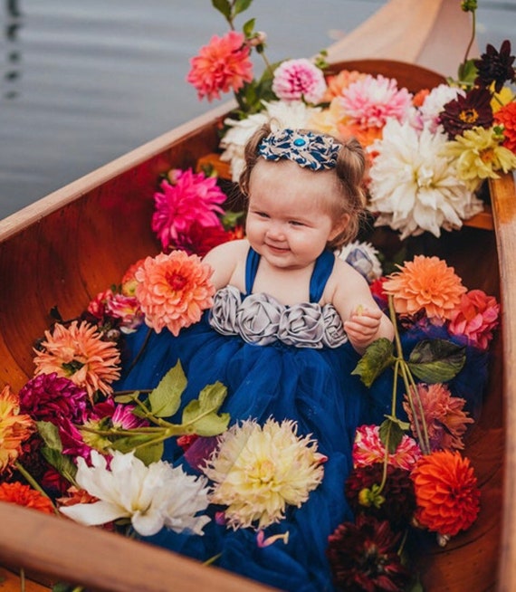 flowers that go with navy blue dress Navy blue bridesmaid dress + coral bouquet