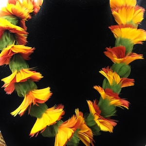 hawaiian handmade as ordered feather lei,gift a feather lei, customizable lei hulu in colors you desire handmade on maui at Maui feather lei