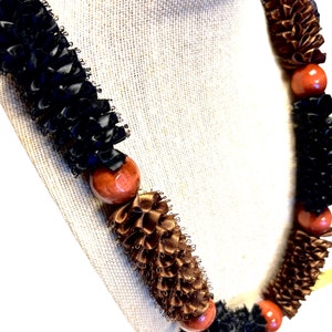 mens lei, representing strength, unity, usefulness, provider everlasting ribbon lei by Maui Feather Lei